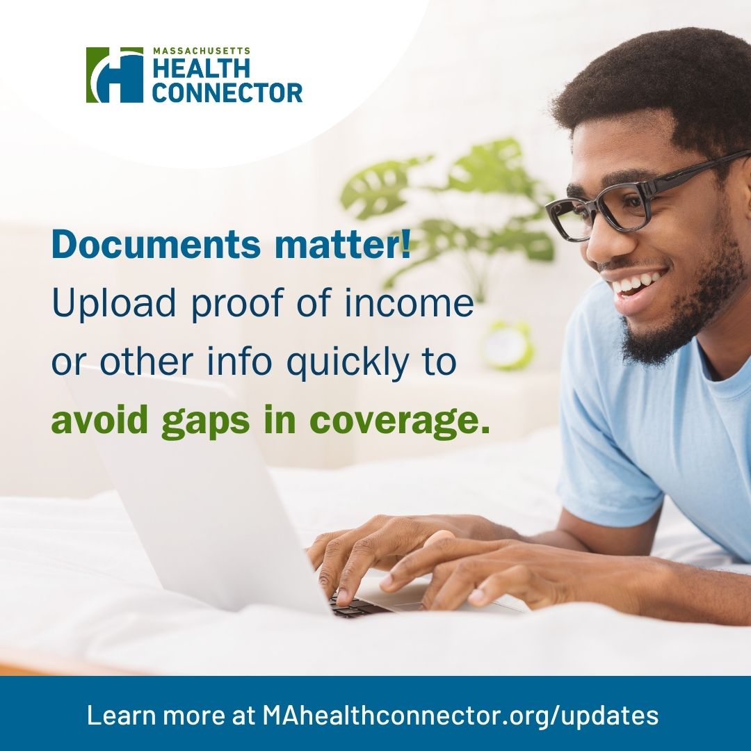Man using laptop for health coverage updates.