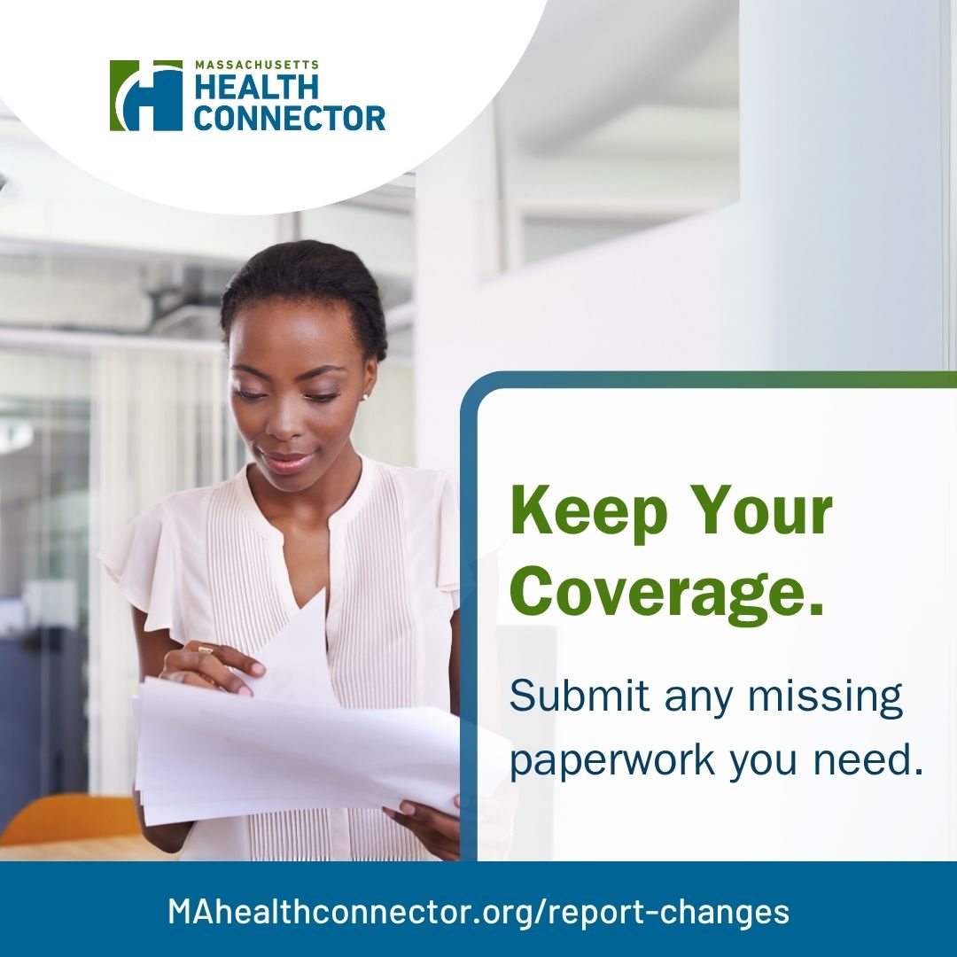 Woman reviewing documents in office setting.