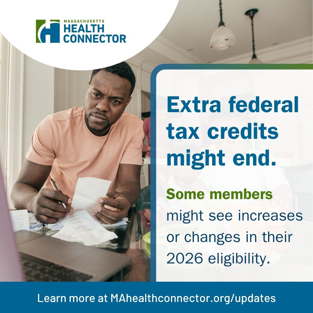 Man reading document, concerned about tax credits.