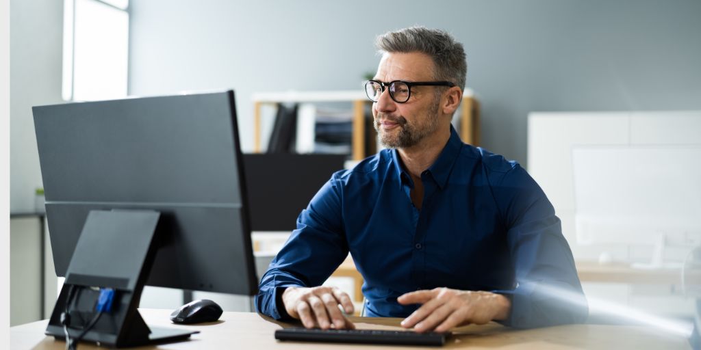 Man using a computer in an office