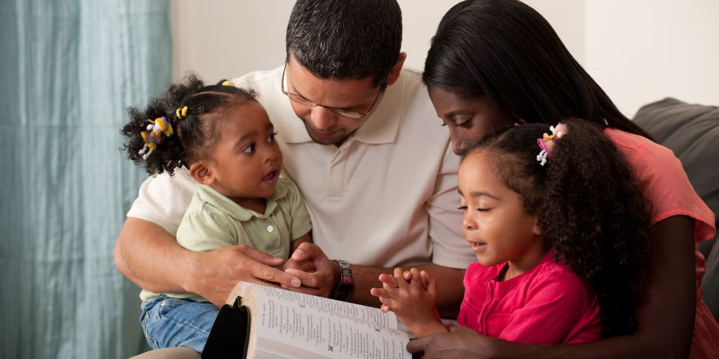 A Family Reading a Book Together